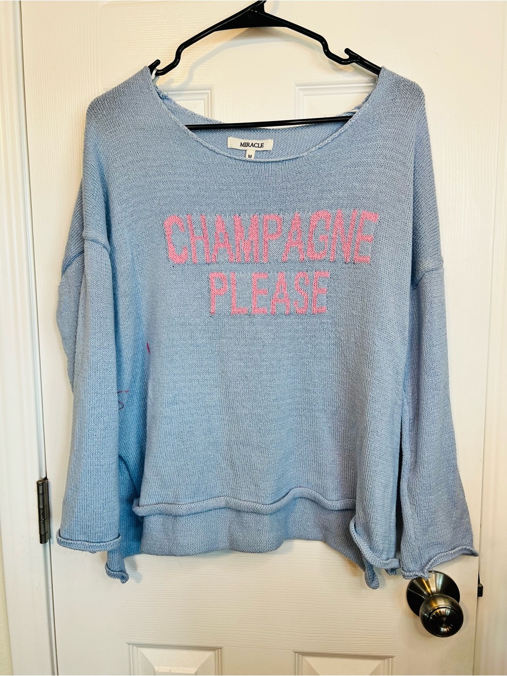 Miracle Light Blue Knit Sweater with Pink 'Champagne Please' Text